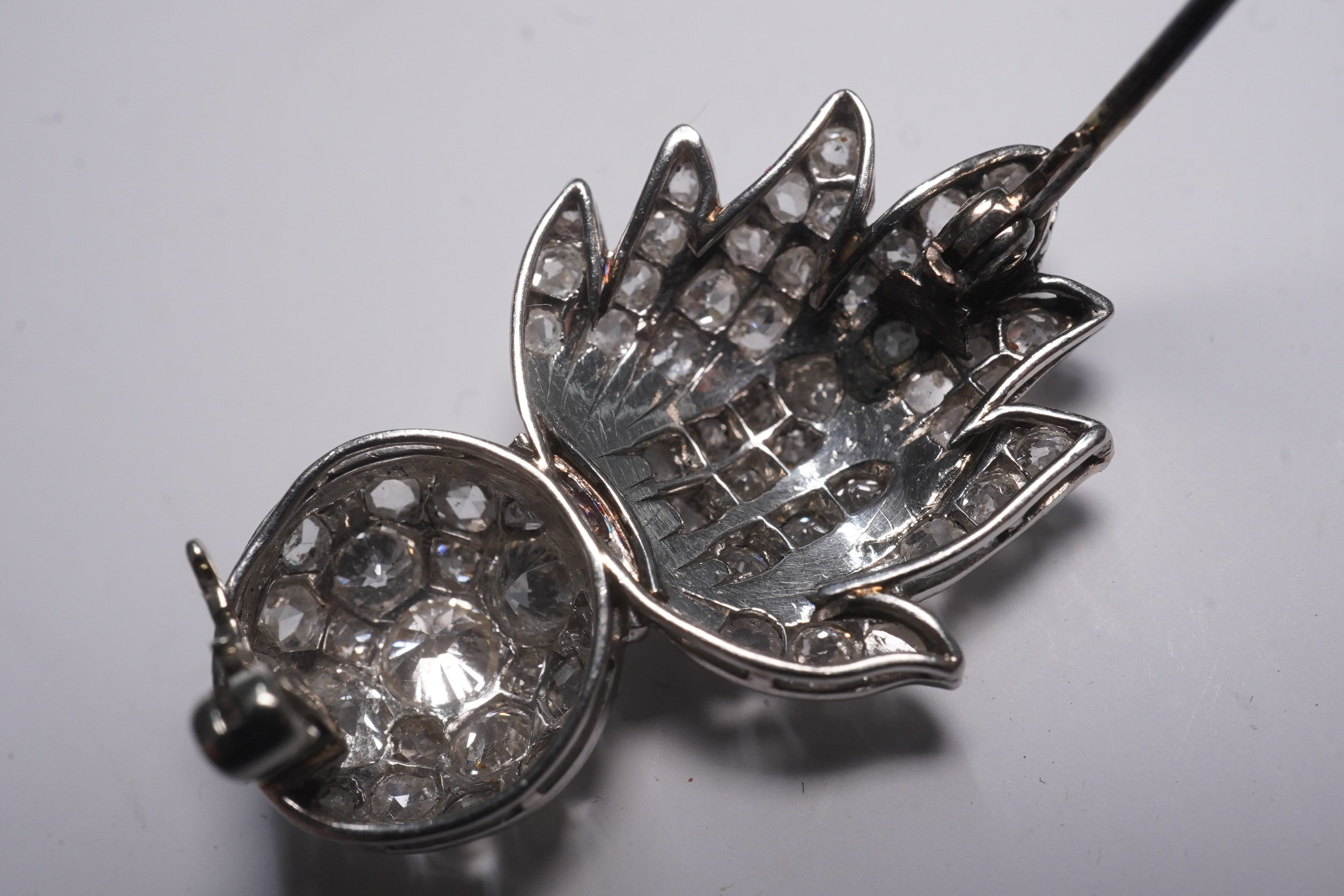 A mid 20th century white gold and pave set diamond Royal Fusiliers sweetheart brooch